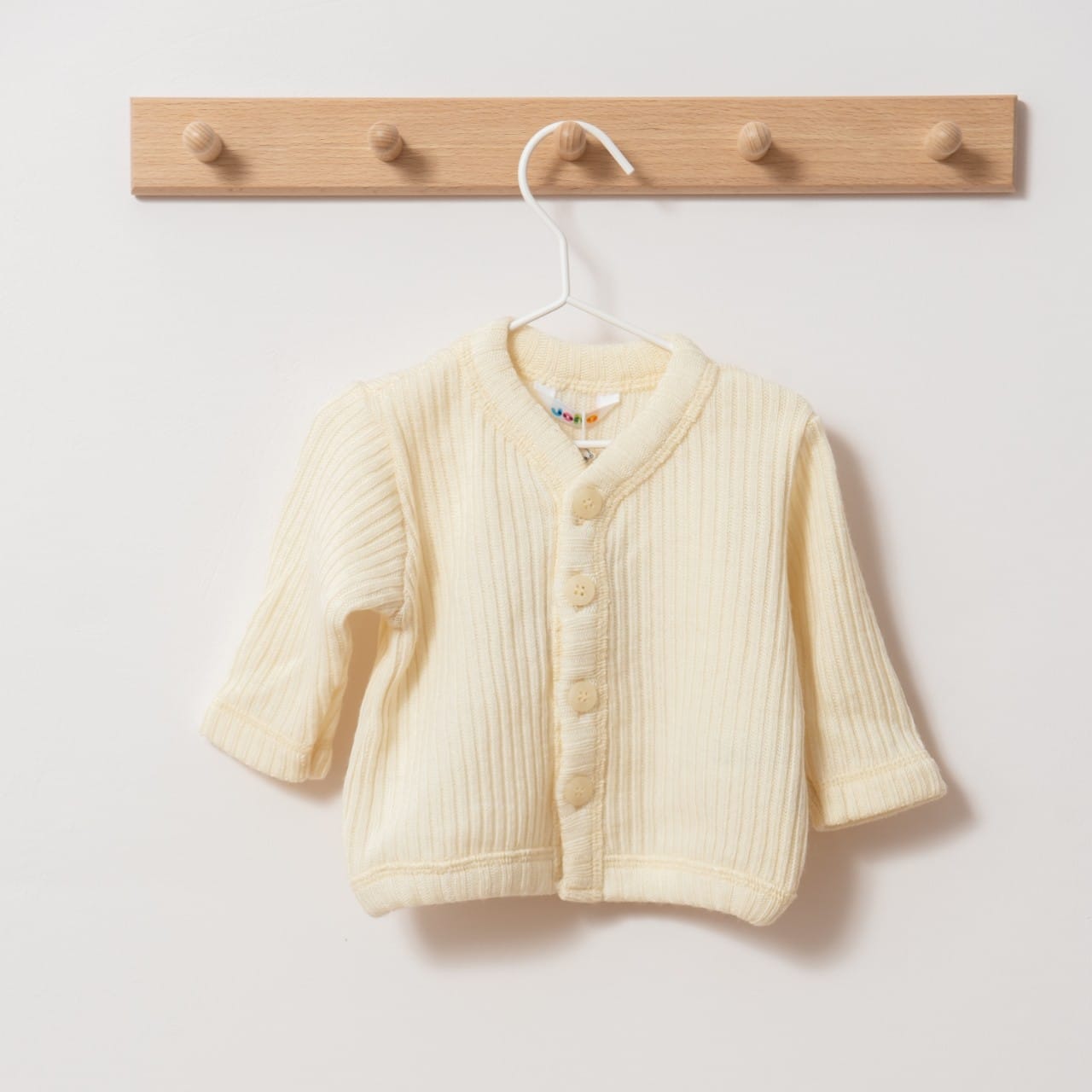 Gilet bébé en laine mérinos - écru Joha • Ode to Wool